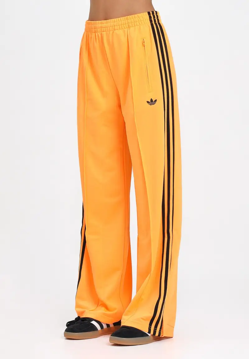 ADIDAS ORIGINALS Pantalone sportivo Adicolor Classic Firebird Loose arancione fluo da donna