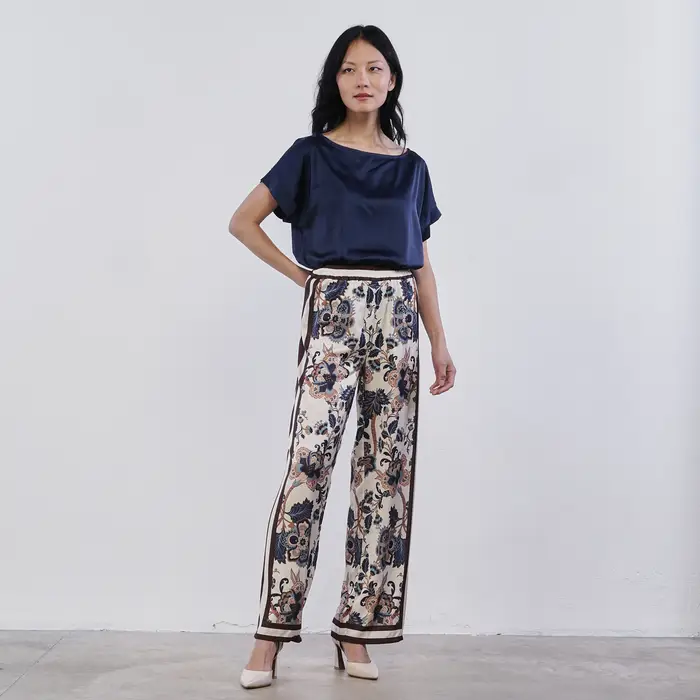 Pantaloni beige e blu in fantasia floreale Alesya da donna