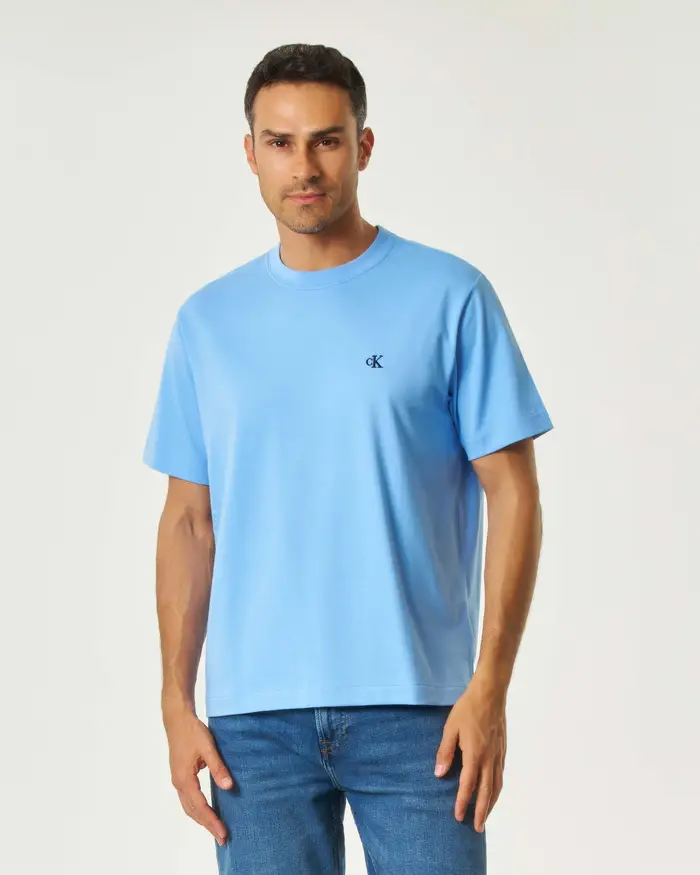 Calvin Klein Jeans T-shirt azzurra mezza manica con logo monogramma piccolo