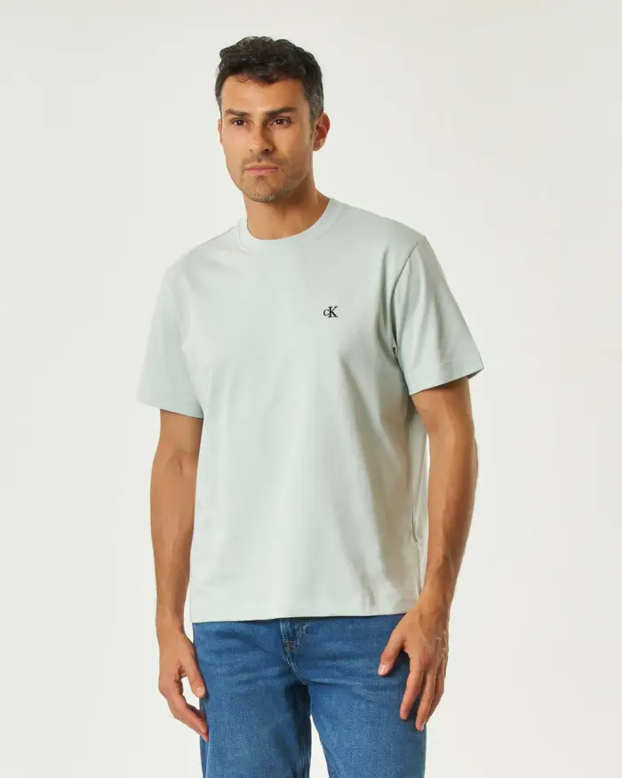 Calvin Klein Jeans T-shirt color acqua mezza manica con logo monogramma piccolo