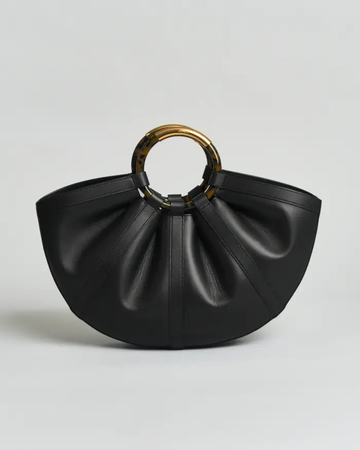 Coccinelle Borsa a mano Shell Medium in pelle liscia nera con manici effetto tartaruga