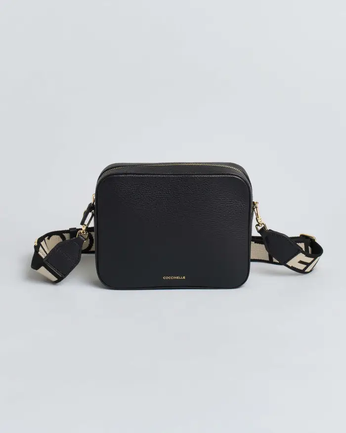 Coccinelle Borsa a tracolla Tebe in pelle nera double-face con tracolla removibile in tessuto