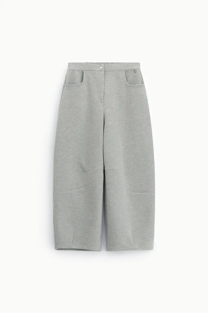 Pantaloni ampi cropped con tasche arrotondate