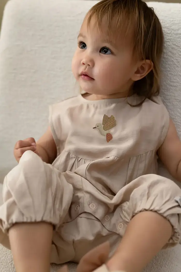 Donsje tutina per bambini Sabla Playsuit Hummingbird Beige