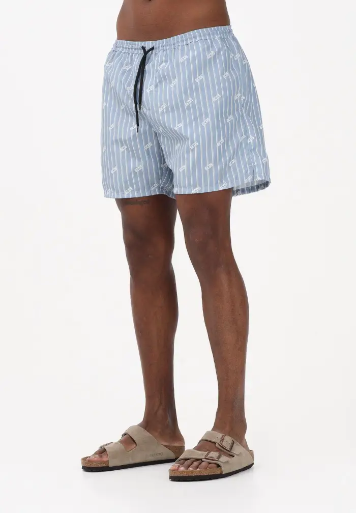 GCDS Shorts mare celeste da uomo con stampa rigata e logo all-over