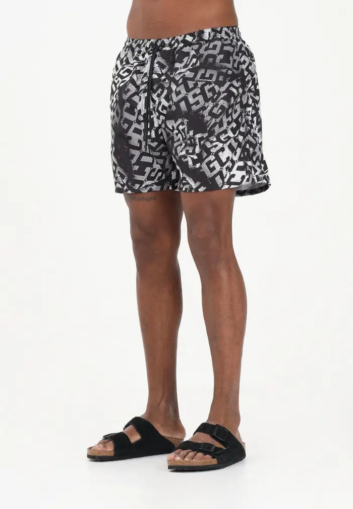 GCDS Shorts mare nero da uomo con stampa logo all-over