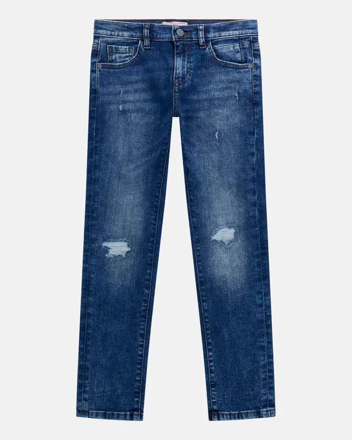 Jeans Guess slim in cotone stretch a lavaggio scuro stone washed con abrasioni