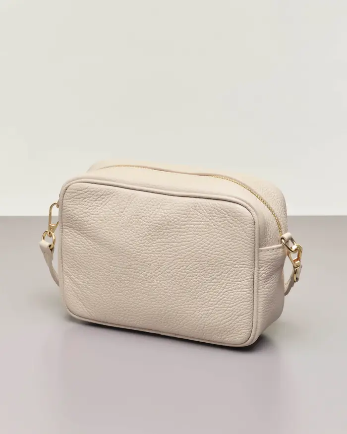 Cross bag color avorio in pelle effetto martellato