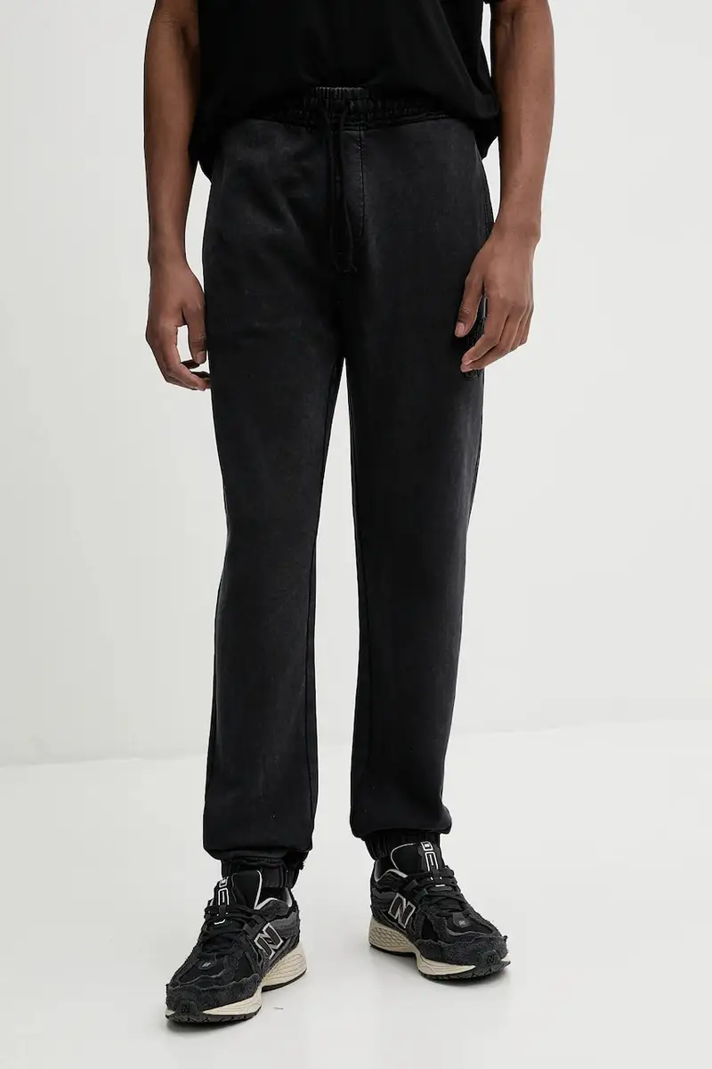 HUGO pantaloni tuta di cotone uomo colore nero con applicazione 50535287