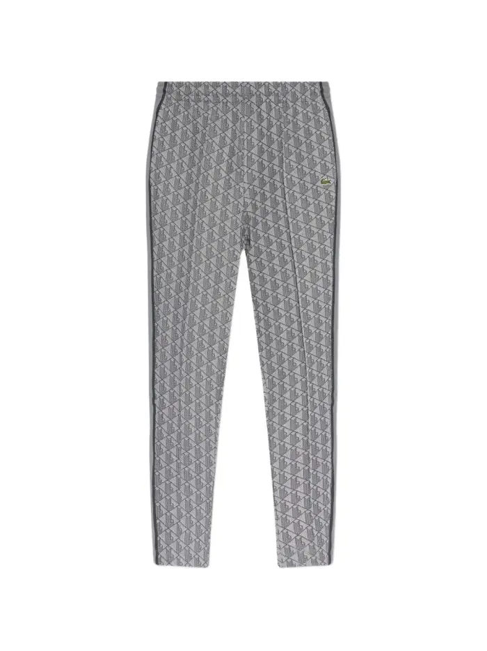 Pantaloni track con motivo all-over e banda laterale
