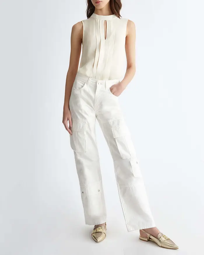 Blusa in crepe di viscosa senza maniche con colletto a listino e fiocco sul retro