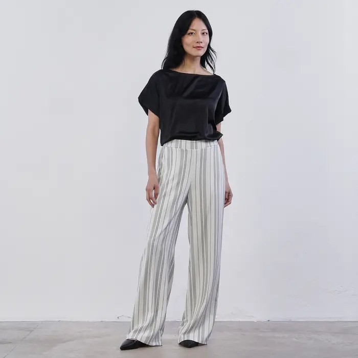 Pantaloni lunghi ampi bianchi e neri Lokita da donna a righe