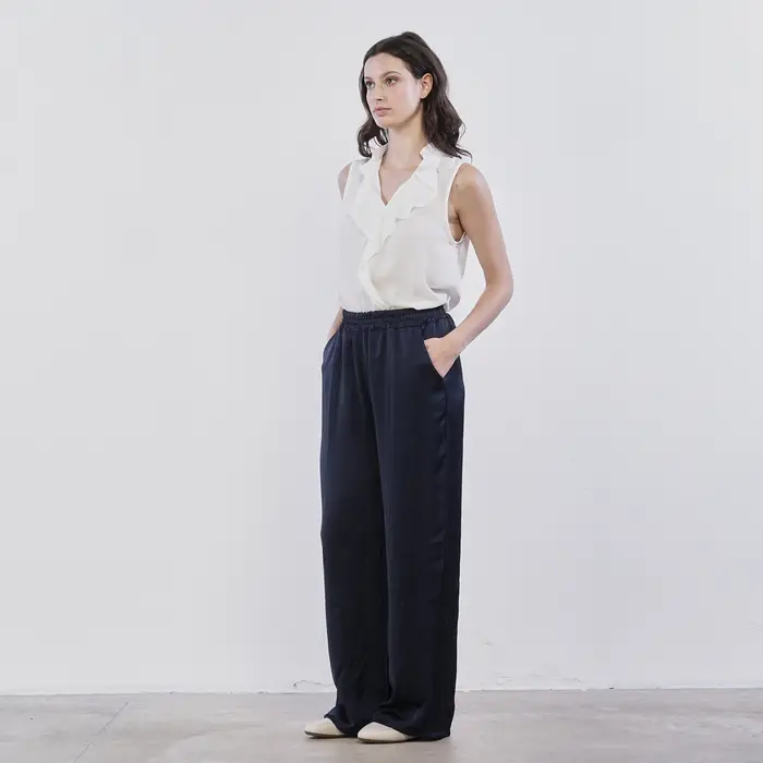 Pantaloni lunghi ampi Lokita da donna in tessuto lucido con tasche