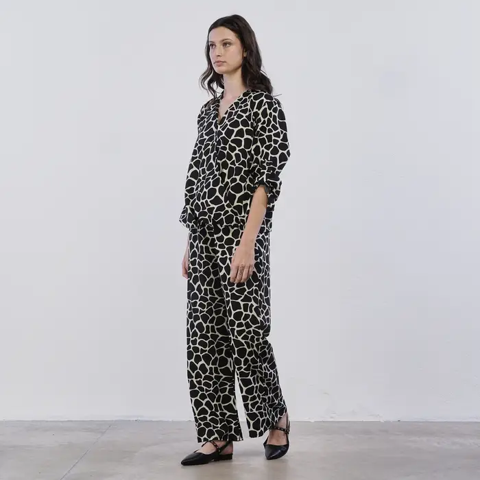 Pantaloni lunghi bianchi e neri Lokita da donna in fantasia animalier