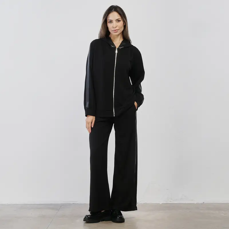 LOKITA Pantaloni lunghi neri da donna con bande laterali in simil pelle