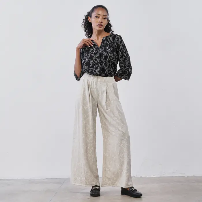 LOKITA Pantaloni lunghi wide leg da donna beige a fantasia floreale