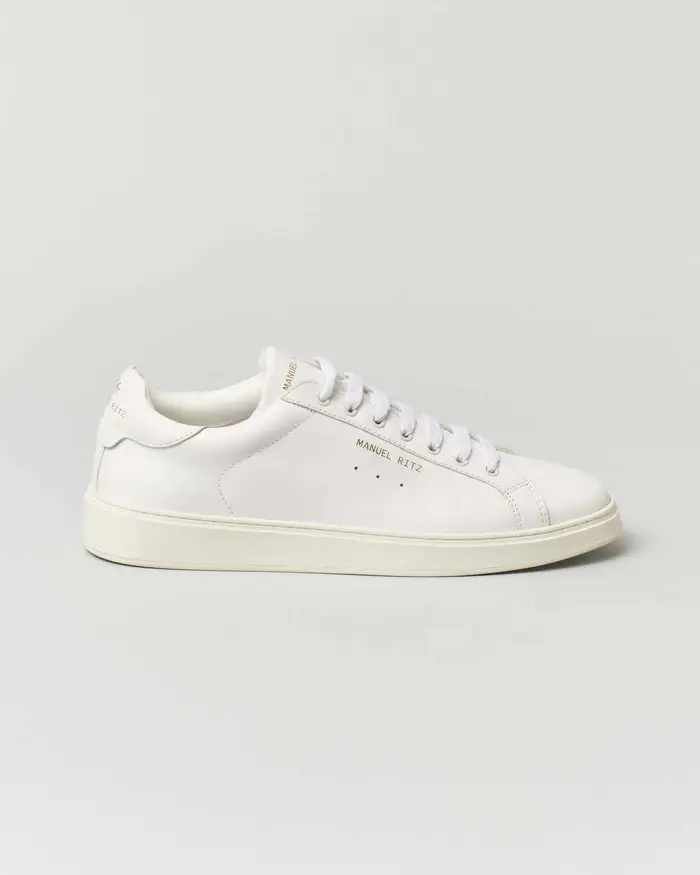 Sneakers bianche in pelle con logo scritta a lato