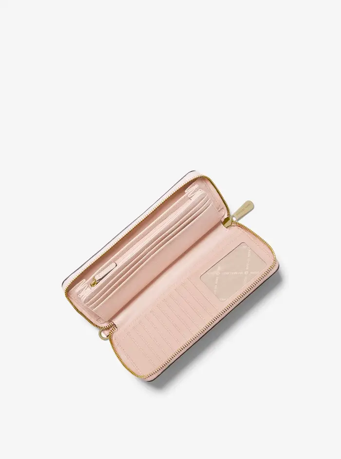 Michael Kors Outlet MK Pochette da polso Jet Set Travel grande in pelle martellata - Rosa - Michael Kors