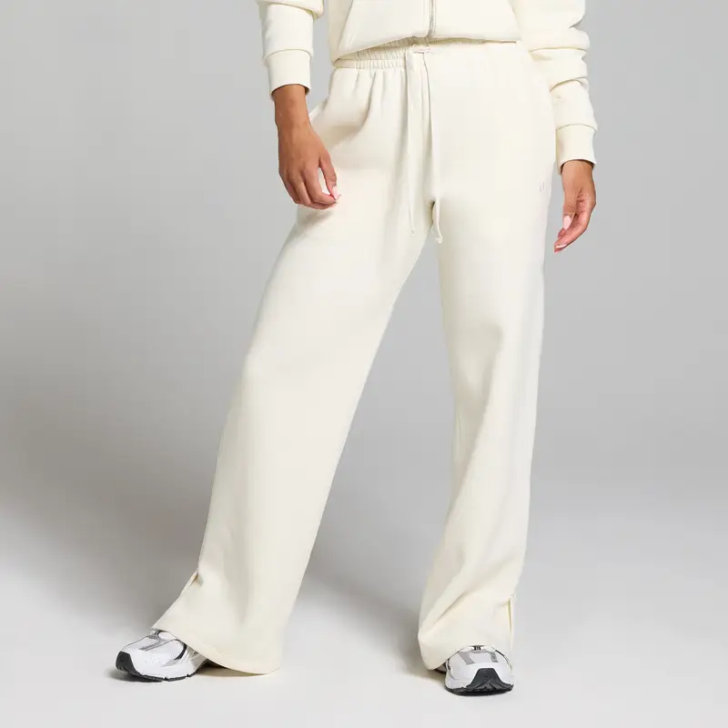 MyProtein Pantaloni da jogging a taglio dritto MP Basics da donna - Crema chiaro