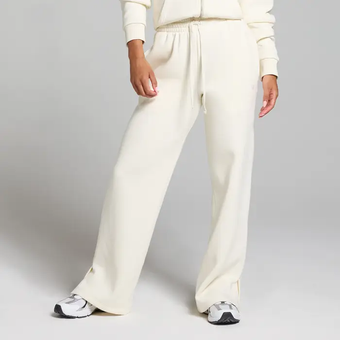 MyProtein Pantaloni da jogging a taglio dritto MP Basics da donna - Crema chiaro