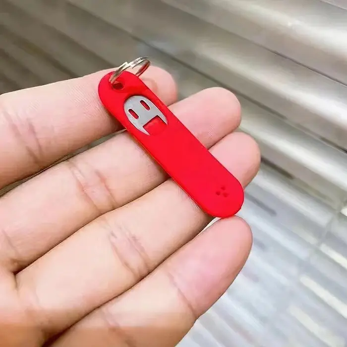 1 pz Portaspilli in silicone per SIM Card Portachiavi Porta ID per telefono Spilli Vassoio per SIM Card Portachiavi Antismarrimento Ago di rimozione in acciaio inossidabile Ditale rosso