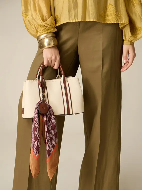 Bauletto bicolor con charm Donna