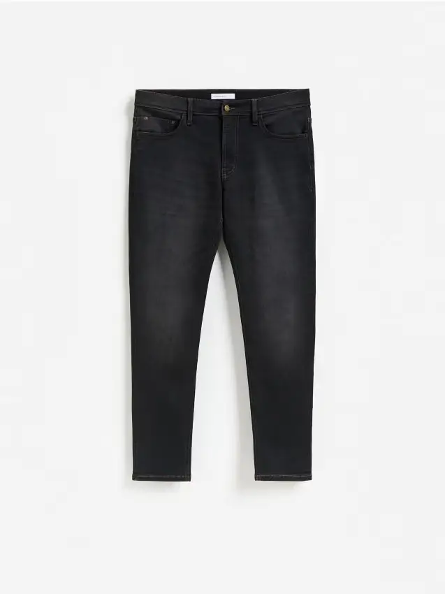 Jeans slim con effetto slavato - grigio