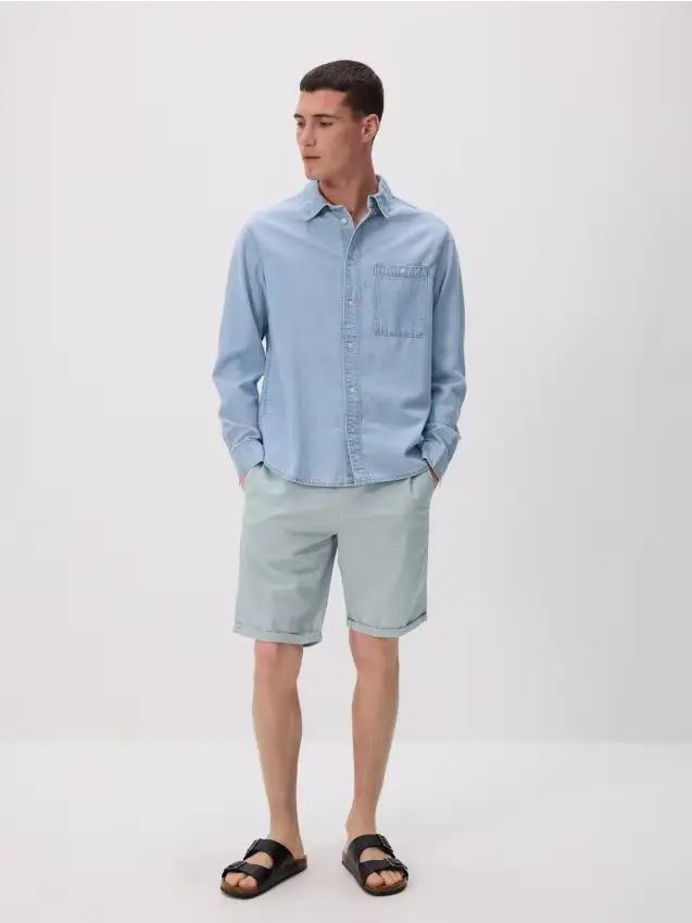 Reserved Pantaloncini chino slim - azzurro