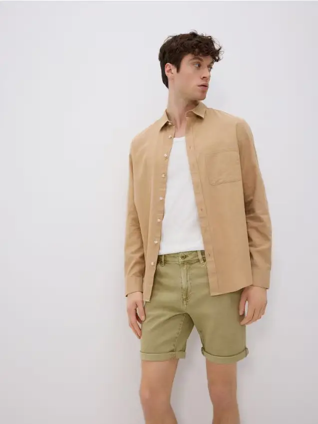 Reserved Pantaloncini denim slim fit - verde