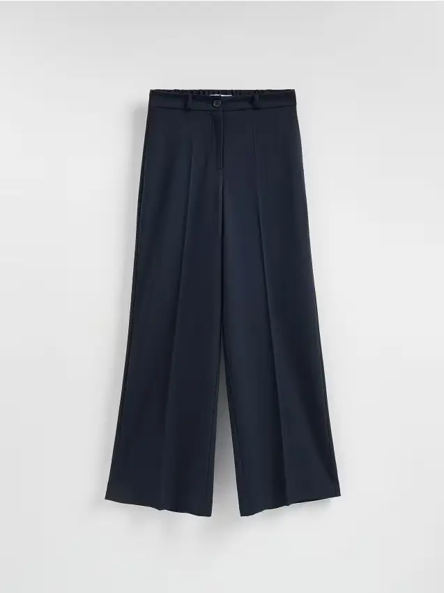 Reserved Pantaloni a gamba ampia con piega stirata - blu scuro