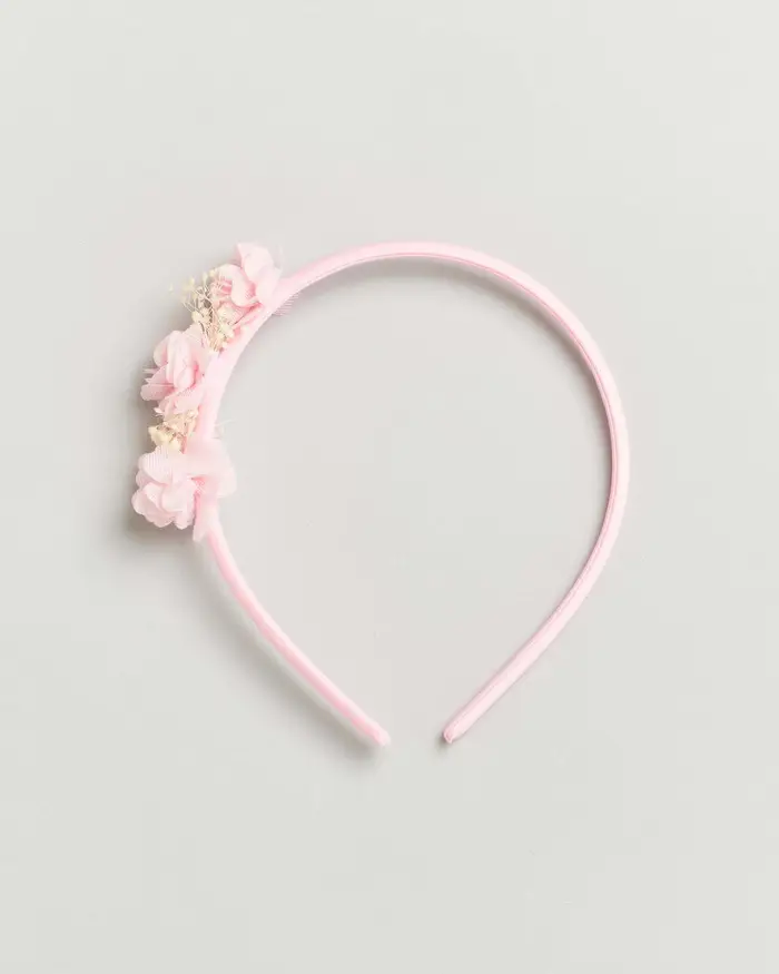 Cerchiello rosa con applicazione floreale