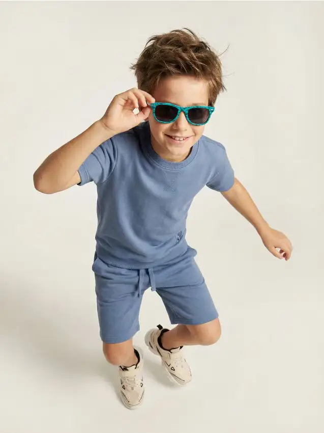 Sinsay Occhiali da sole con stampa di dinosauri - multicolor