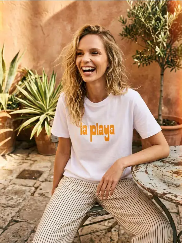 T-shirt in cotone con scritta - bianco