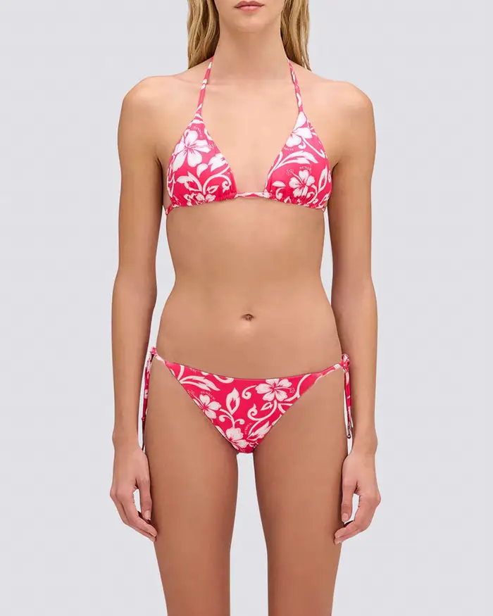 Bikini Sundek fucsia a fiori bianchi con top a triangolo e slip sgambato con laccetti