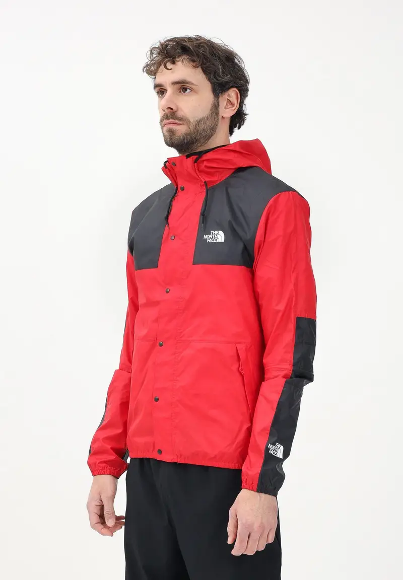 The North Face Giacca a vento Seasonal Mountain rossa e nera da uomo