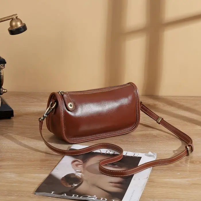 Borse da donna versatili di nicchia in pelle bovina, borse a tracolla, borse da donna semplici, dumpling con cerniera, borse a mezzaluna colore marrone scuro